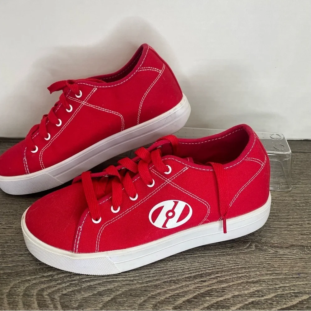 Heelys Red Sneakers with White Logo. Size 7.Skate shoes. Used- has marks.